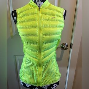 Nike Womens Aeroloft 800
Down Running Vest, Volt Yellow, Size Small.